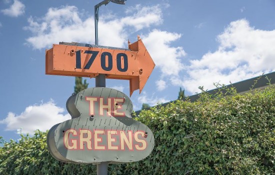 Welcome To The Greens Hotel - The Greens Hotel Sign